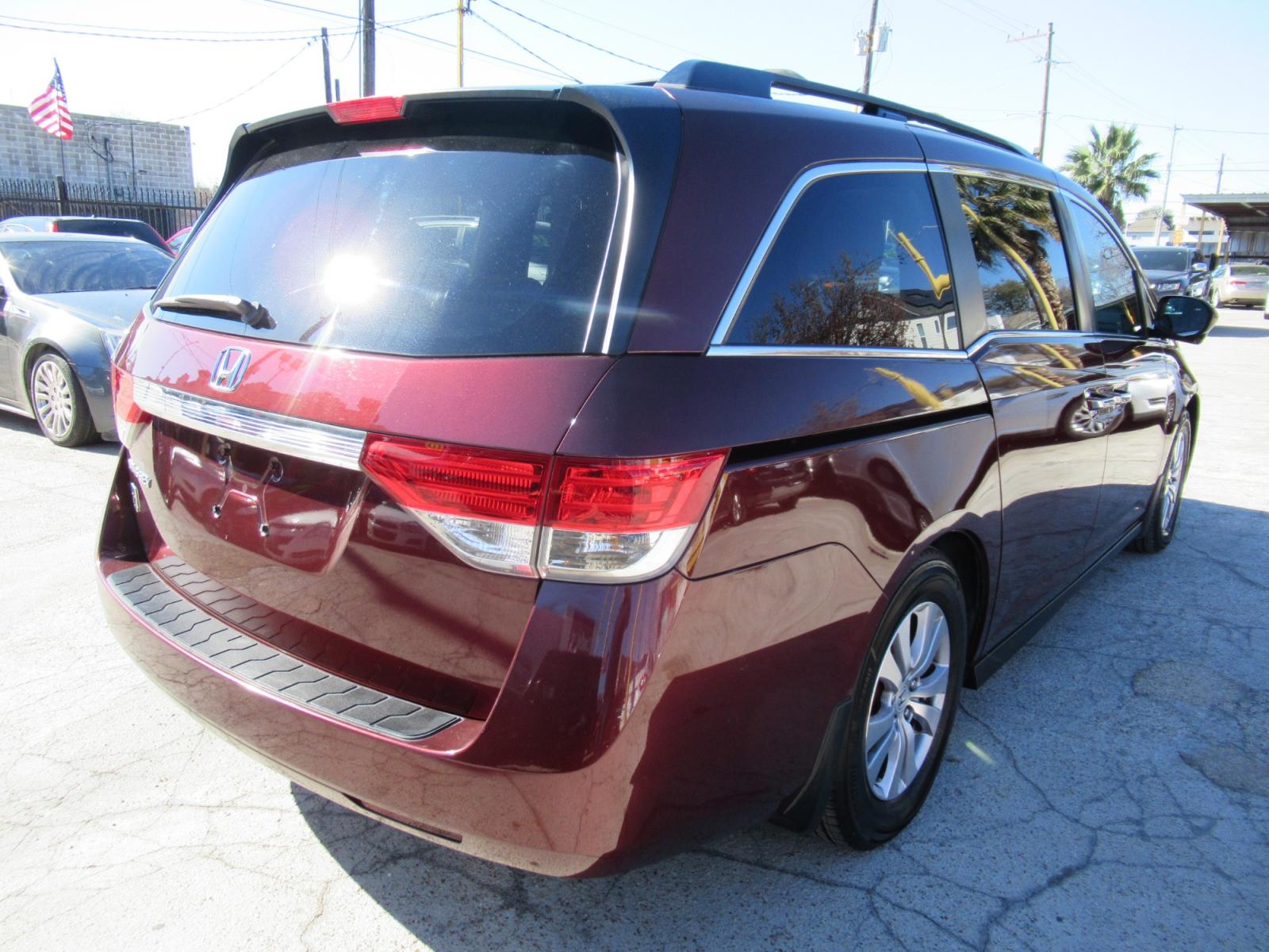 2016 Red /Tan Honda Odyssey EX-L (5FNRL5H62GB) with an 3.5L V6 SOHC 24V engine, Automatic transmission, located at 1511 North Shepherd Dr., Houston, TX, 77008, (281) 657-1221, 29.798361, -95.412560 - 2016 HONDA ODYSSEY EX-L VIN: 5FNRL5H62GB103369 5 F N R L 5 H 6 2 G B 1 0 3 3 6 9 VAN 3.5L V6 F SOHC 24V GASOLINE FRONT WHEEL DRIVE - Photo #37